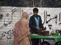 Boy selling fish